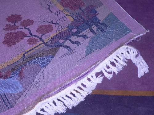 Hand rug repair example
